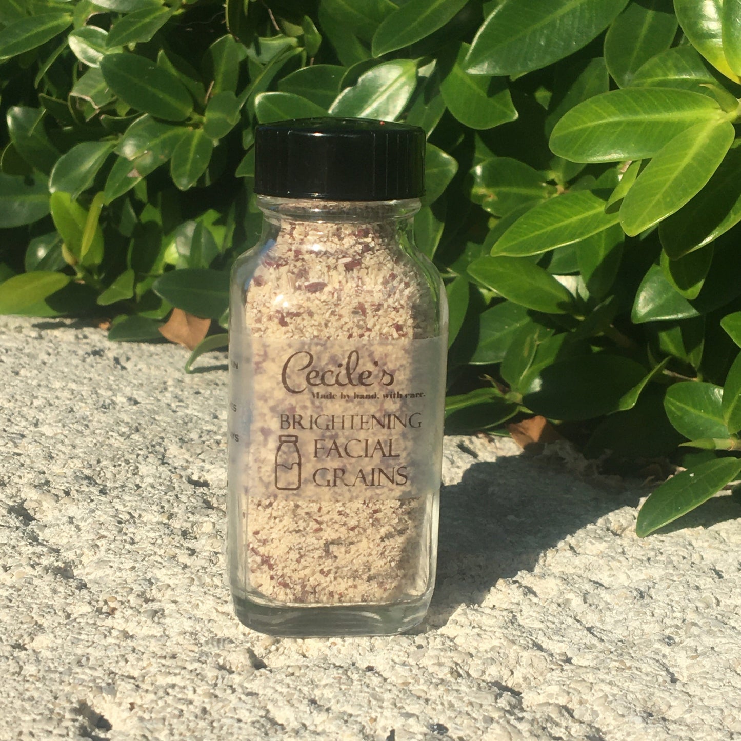 Bottle of Cecile's facial brightening grains