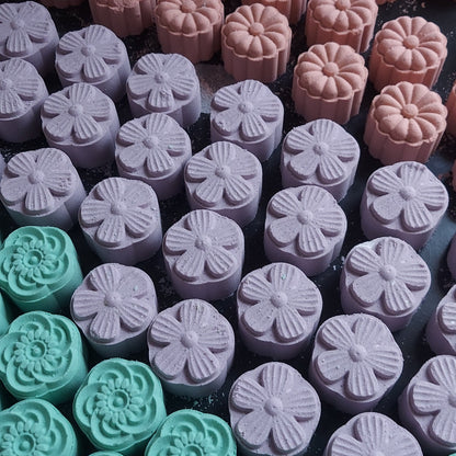 Mini bath bombs in pink, purple and turquoise 